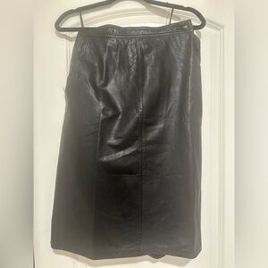 “Black leather skirt (size 10)
